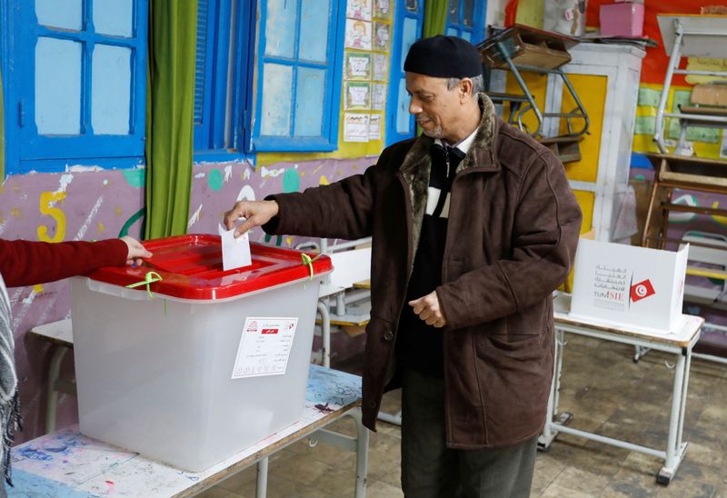 Few early voters in Tunisian election amid political change