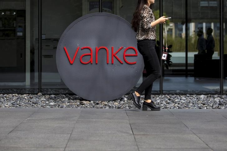 Property developer China Vanke raises $500 mln, shares sink