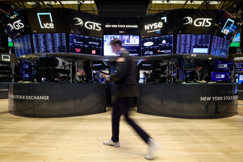 Wall Street jumps with rosy outlooks from companies